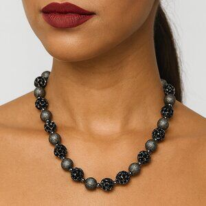 BLACK AND GRAY BEADED NECKLACE FEATURING ALTERNATING SMOOTH AND FACETED BEADS...